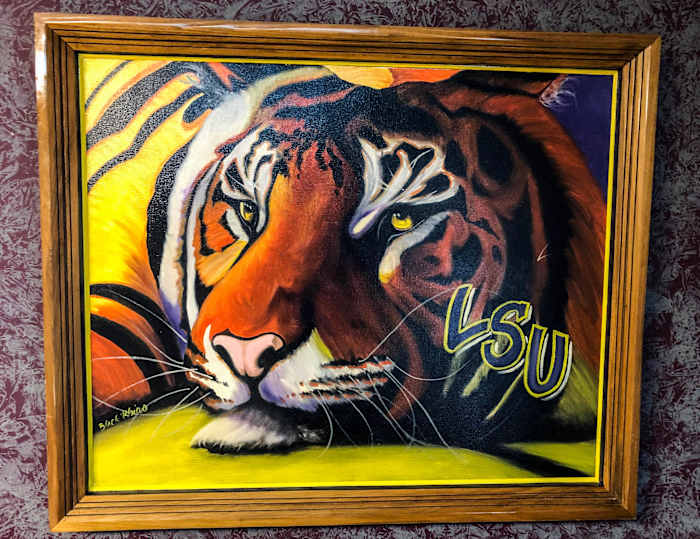 The Black Rhino's tiger adorns his lawyer's office wall in New Iberia.